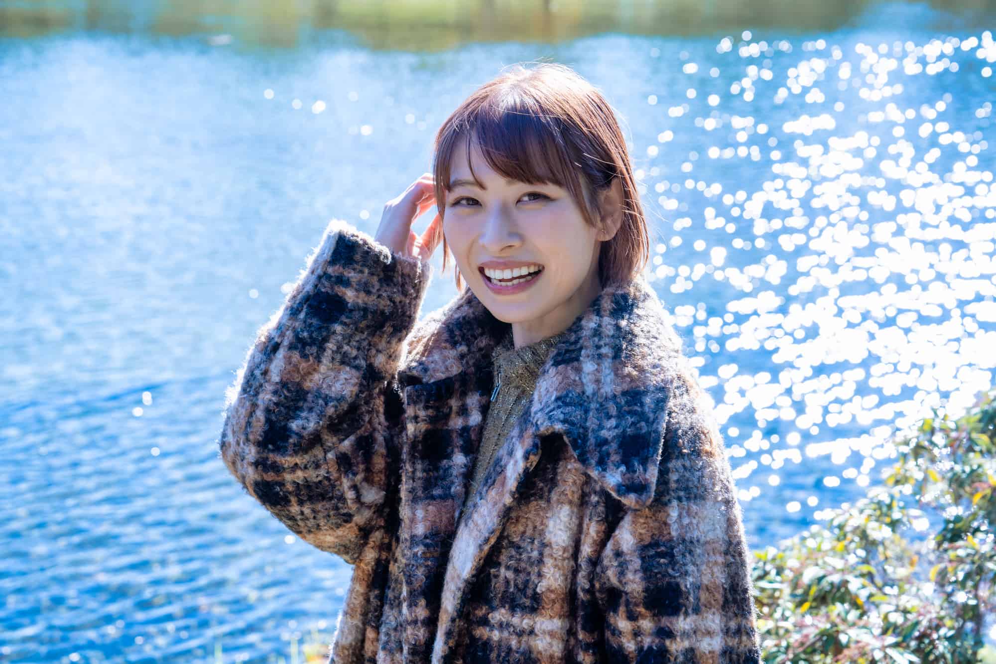 インビザラインで矯正した美しい歯ならびの女性