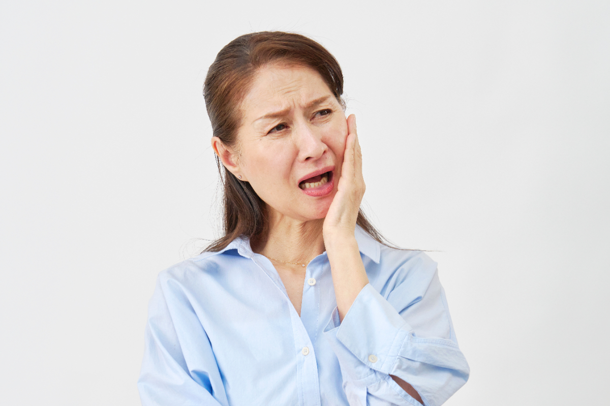 入れ歯を装着したときに痛みが出た女性